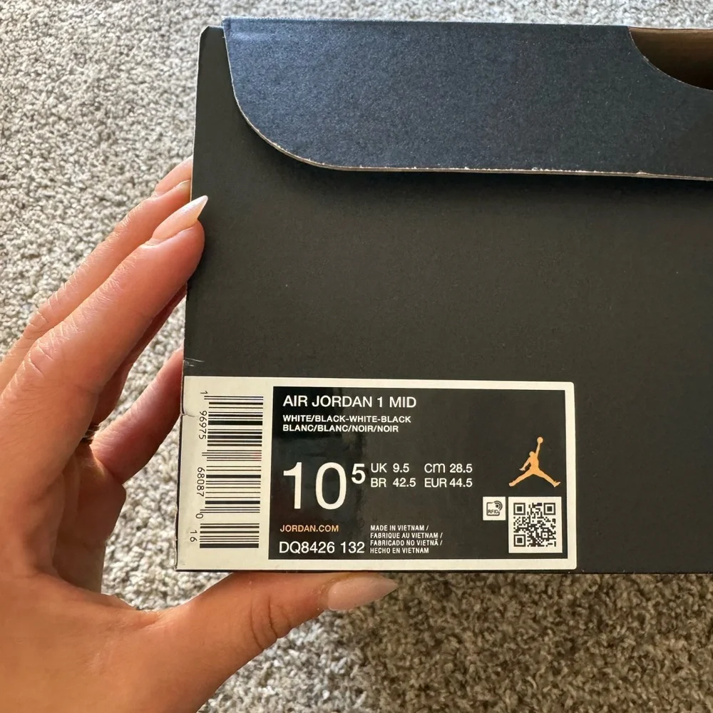 Jordan White and Black Mid-Top Sneakers